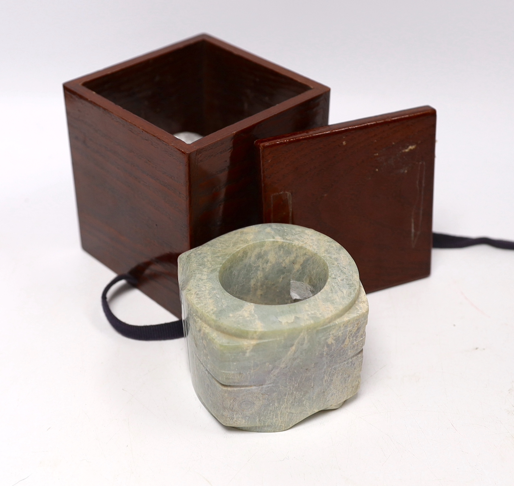 A Chinese jade cong, in a case, 6cm high